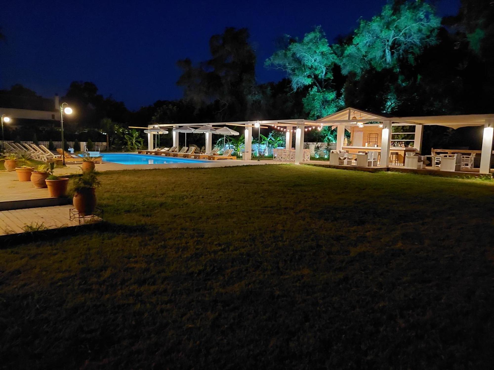 Aparthotel Amelia'S Garden Kávos Esterno foto