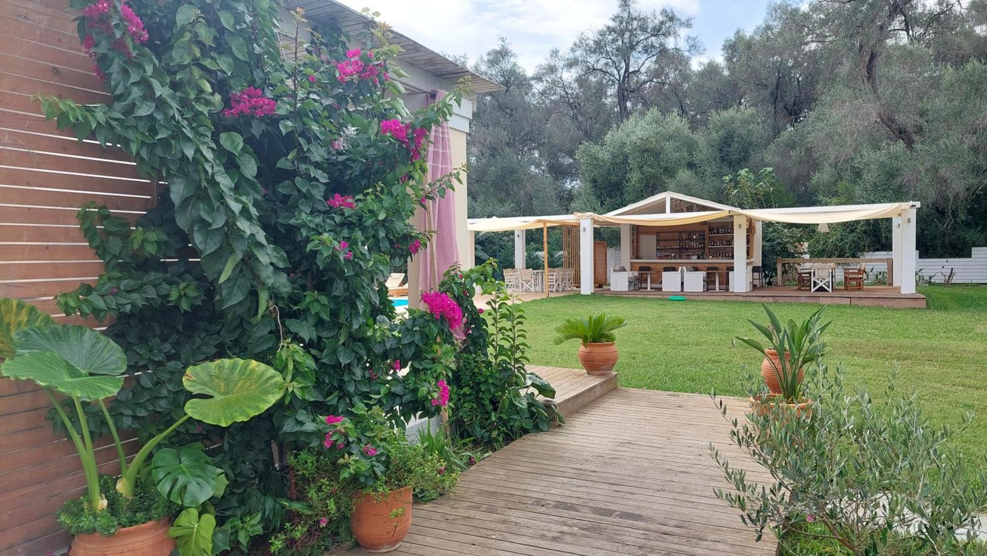 Aparthotel Amelia'S Garden Kávos Esterno foto
